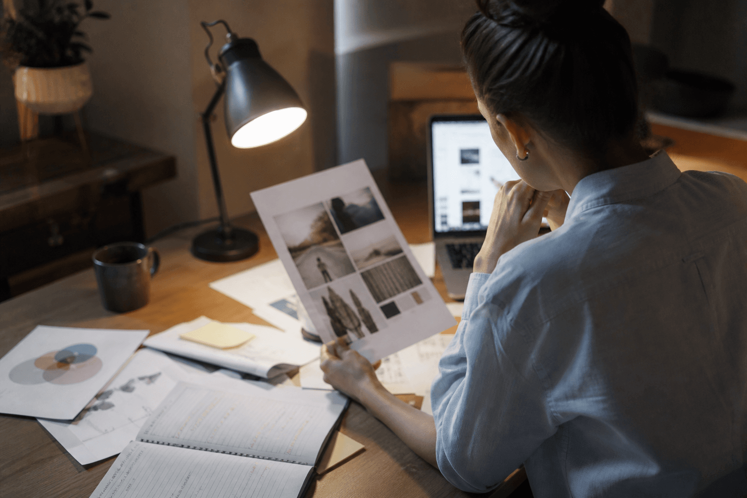 Agency account manager reviewing a client report draft at a desk
